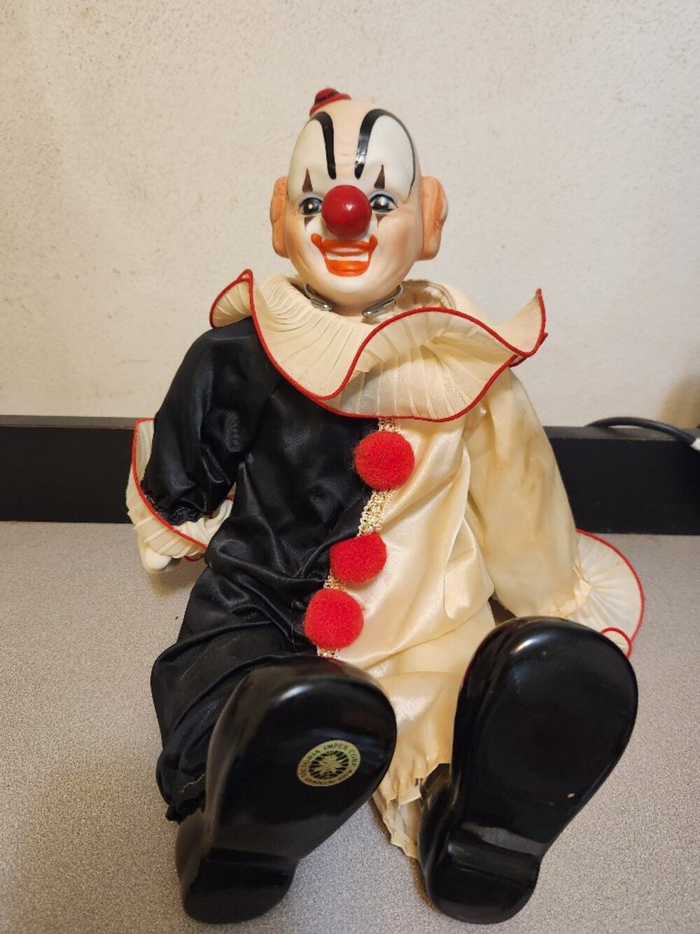 Seated Porcelain Musical Wind Up Clown Doll Victoria Impex Corp with Stand